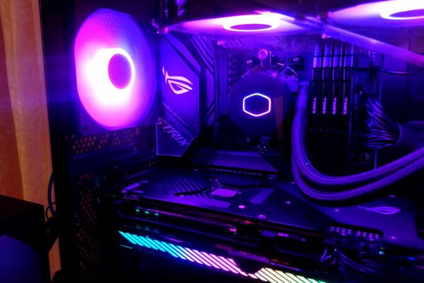 Inside of a gaming PC with fluorescent lighting.