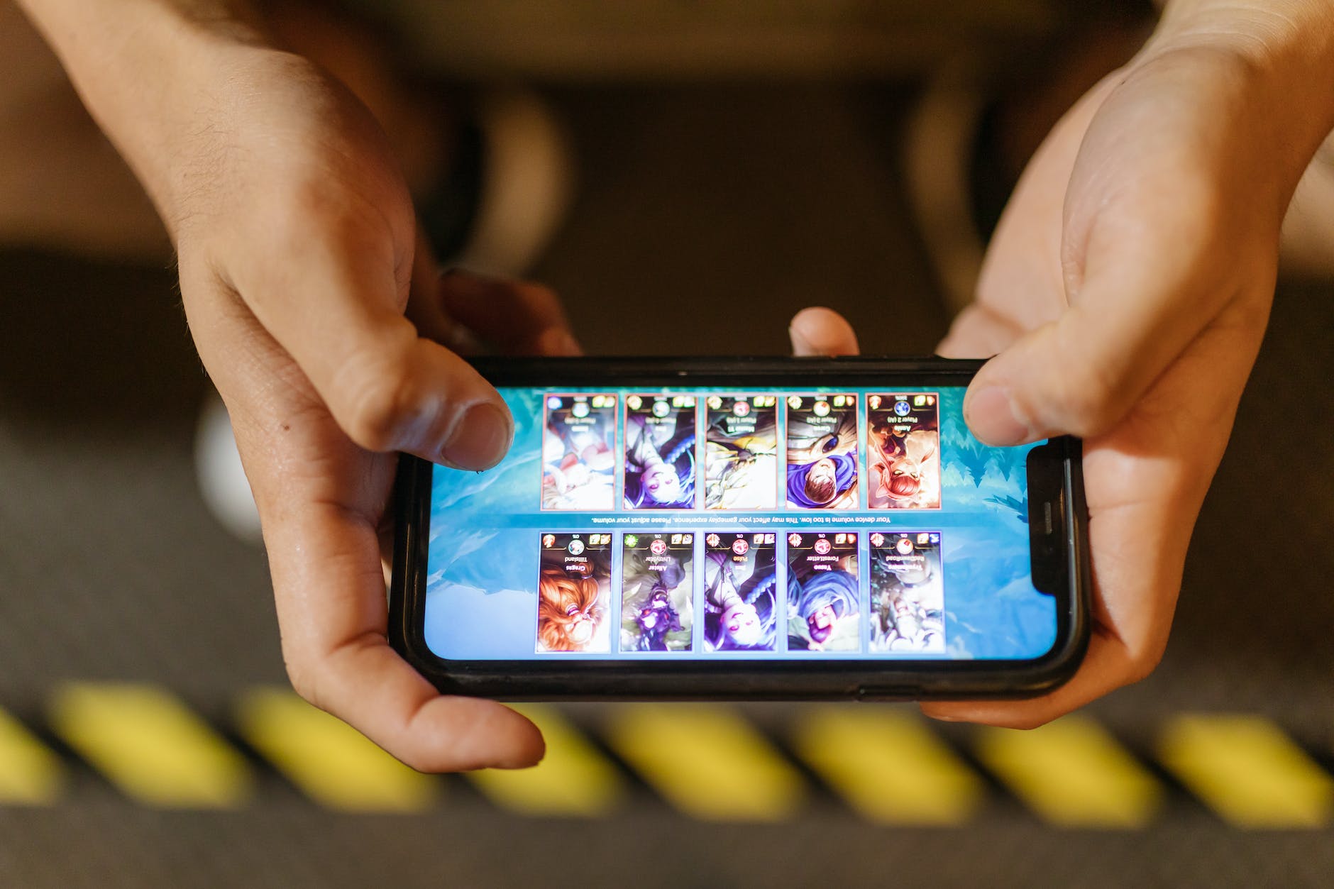 close up view of a person playing league of legends