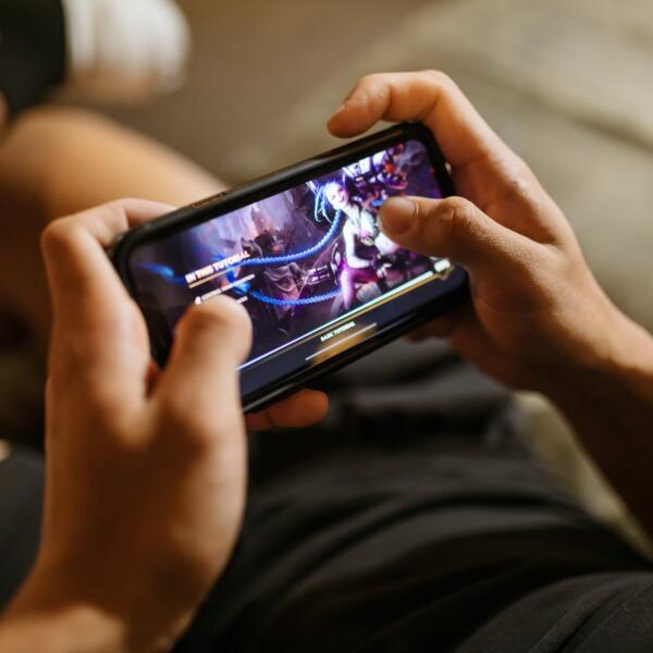 close up view of a person playing league of legends