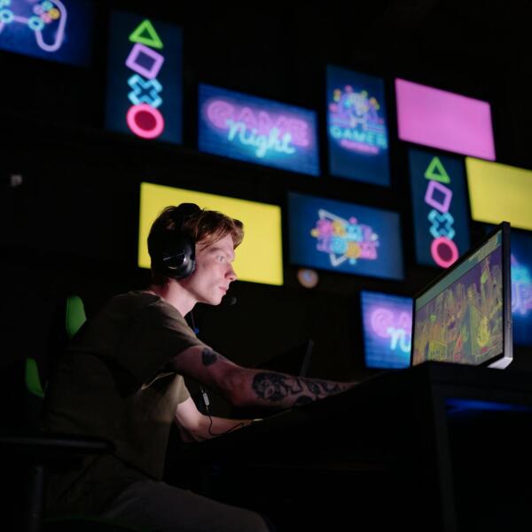 a man playing a video game in a computer
