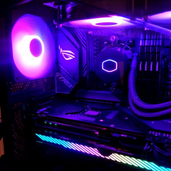 Inside of a gaming PC with fluorescent lighting.